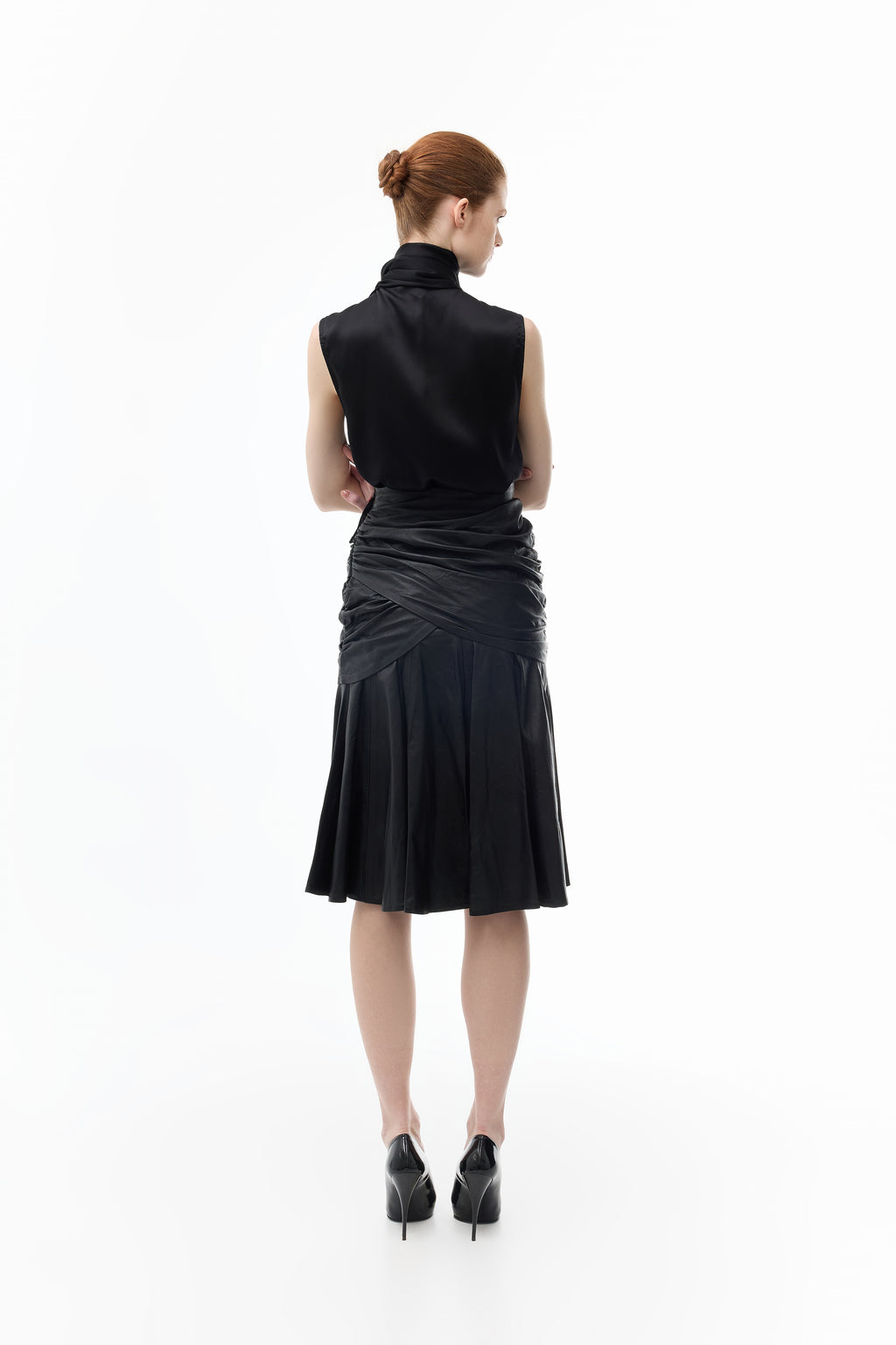 Box Pleated Midi Skirt in Leather in black — back view