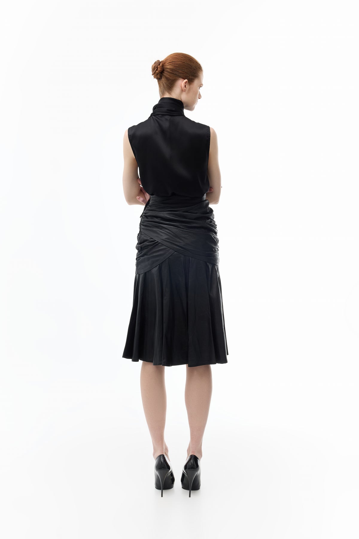 Box Pleated Midi Skirt in Leather in black — back view