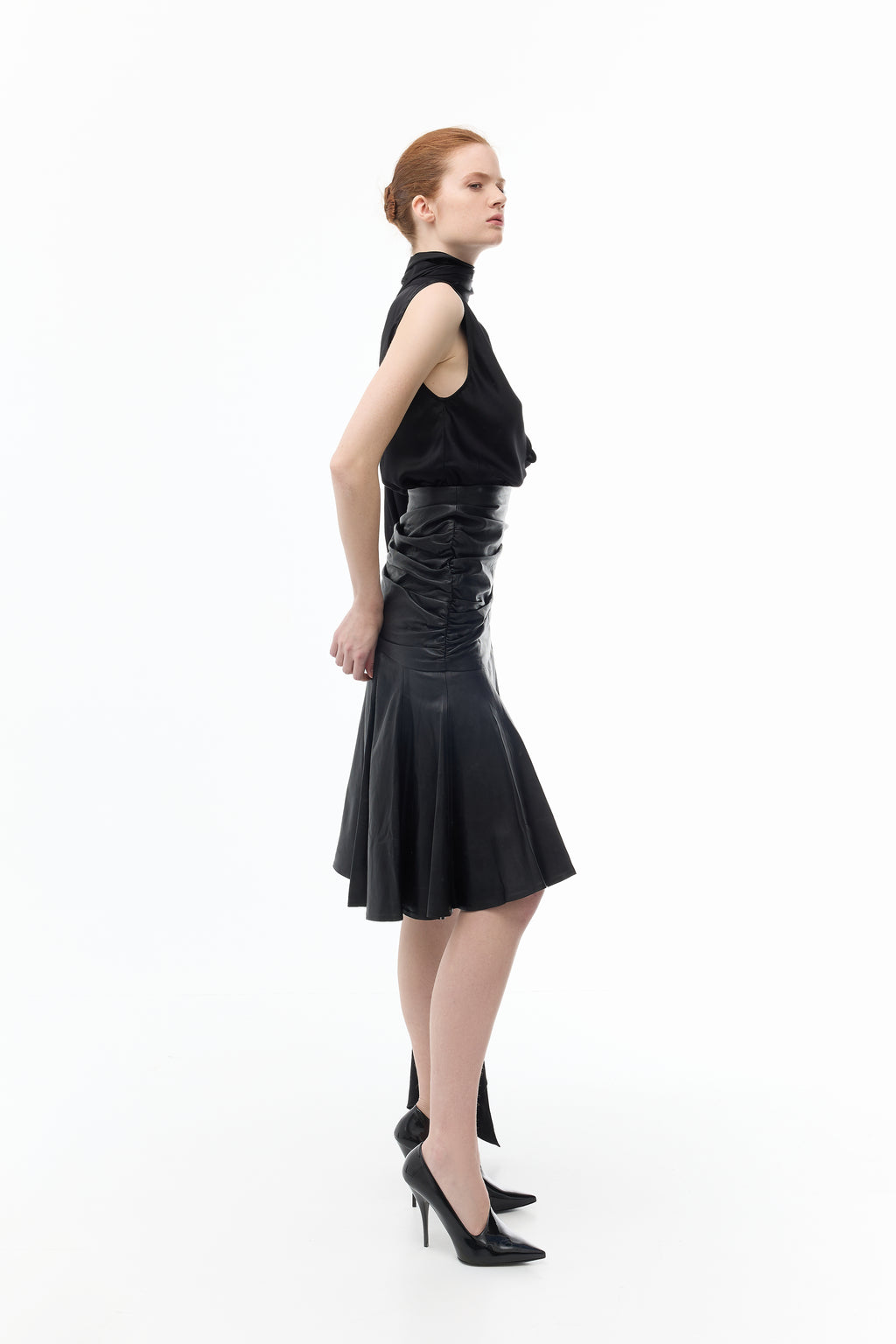 Box Pleated Midi Skirt in Leather in black — side view